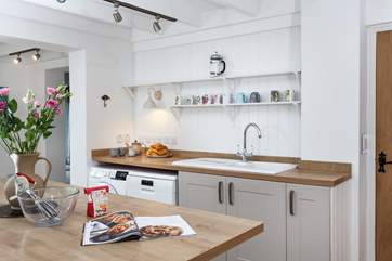 There is everything you might need in this kitchen.