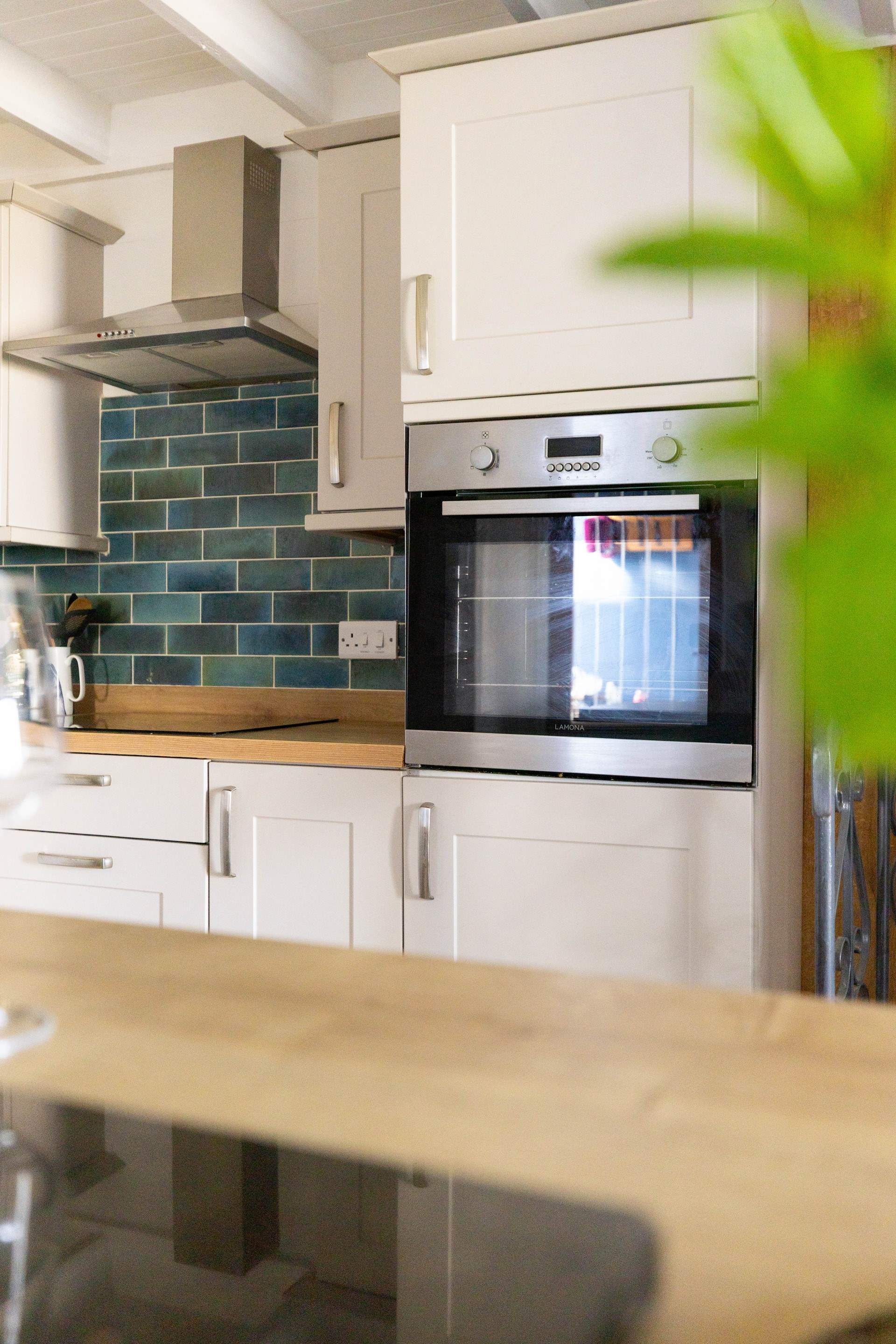 The kitchen has plenty of work space for either cooking (or unwrapping) your evening meal (or your fish and chips). 