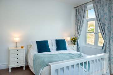 Pretty bedroom 3 has a double bed.