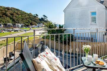 Treat yourself to morning coffee on the balcony.