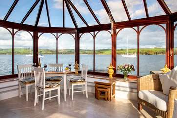 The conservatory provides an alternative option for dining.