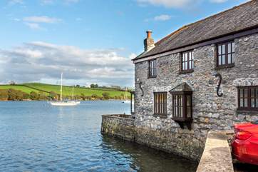 The rolling green countryside provides a wonderful contrast to the blue of the water.
