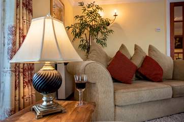 The sitting-room invites you to unwind and relax.