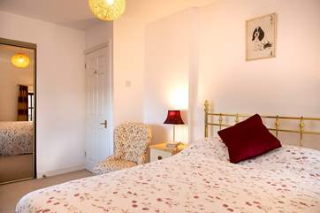 Pretty floral fabrics in the third bedroom.