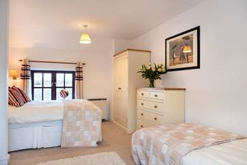 Bedroom 1 has a double and a single bed.