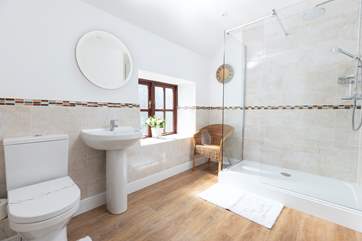 The family bathroom with a fabulous shower which is the latest upgrade at this house.