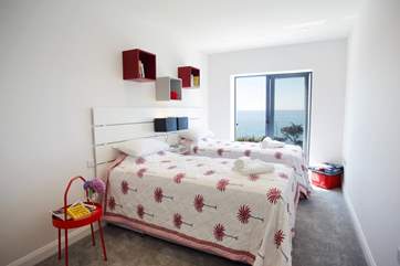 This room can also be made up as a double or twin beds and shares a balcony with the bedroom next door.