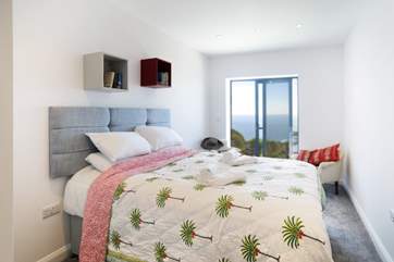 Bedroom 1 has a comfy super-king size bed and of course stunning views - it will make it difficult to get out of bed in the morning.