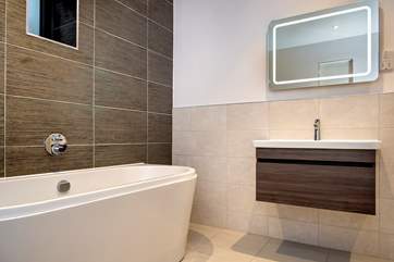 There are four stylish bath/shower rooms.