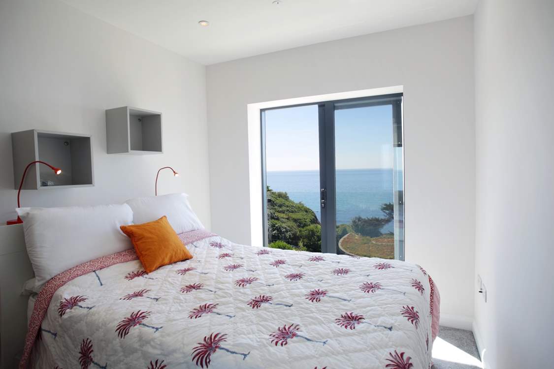 Bedroom 4 is on the second floor and also has a large picture window which you can open wide to breathe in that sea air or simply listen to the sounds of the seaside.