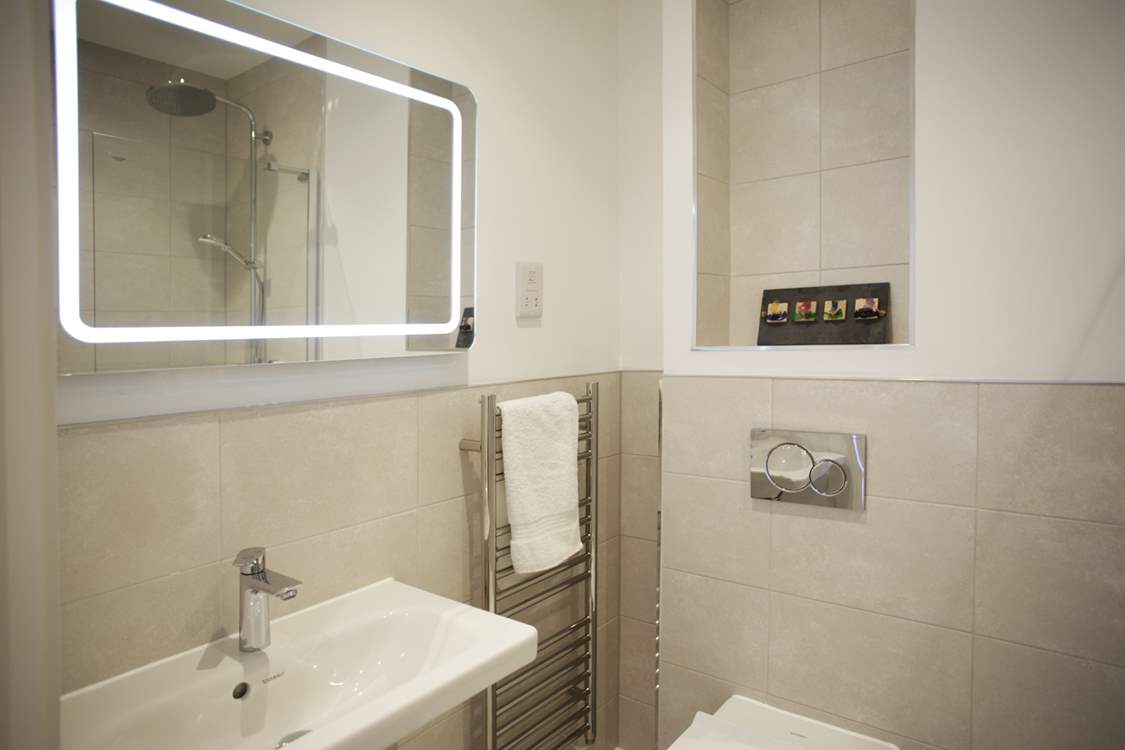 Bedroom 1 has an en suite bathroom.