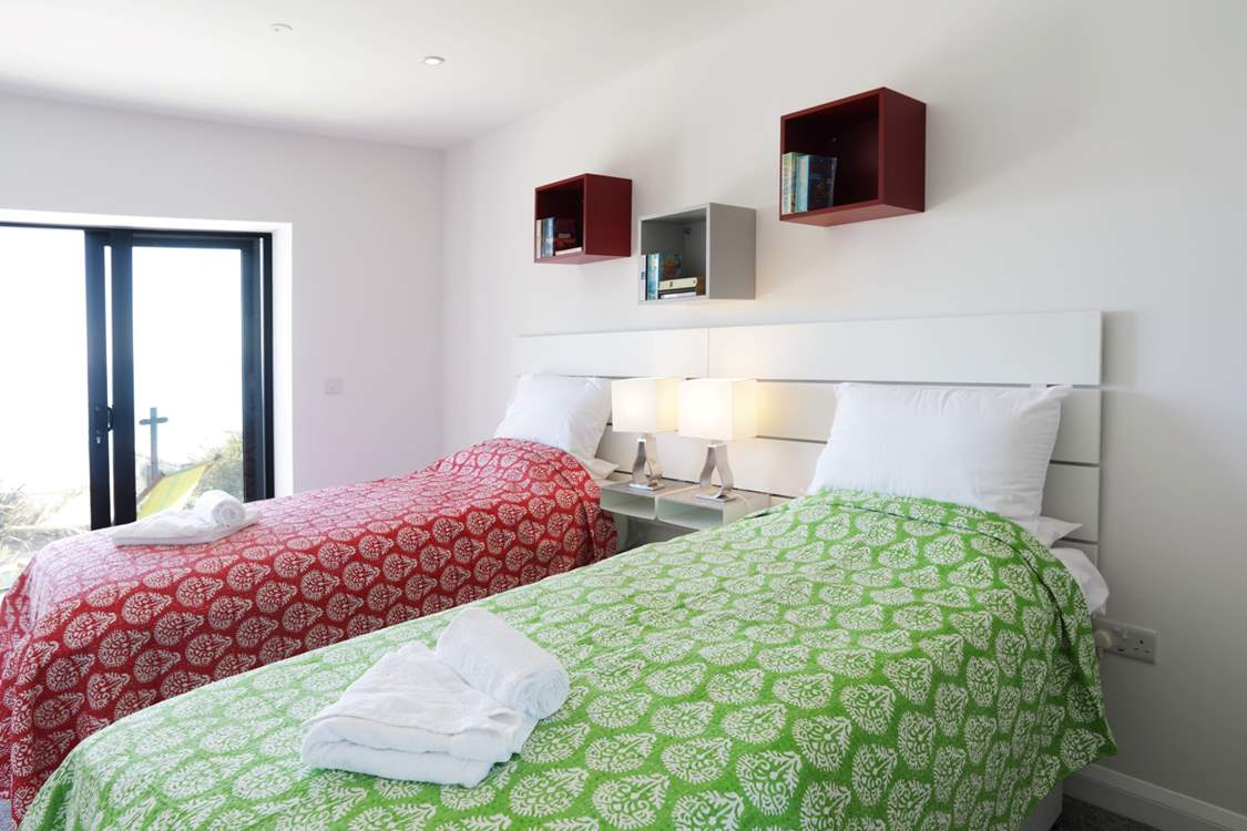 Bedroom 3 can also be set up as a super-king size double, or twin beds, and also has a balcony so you can get even closer to the view.