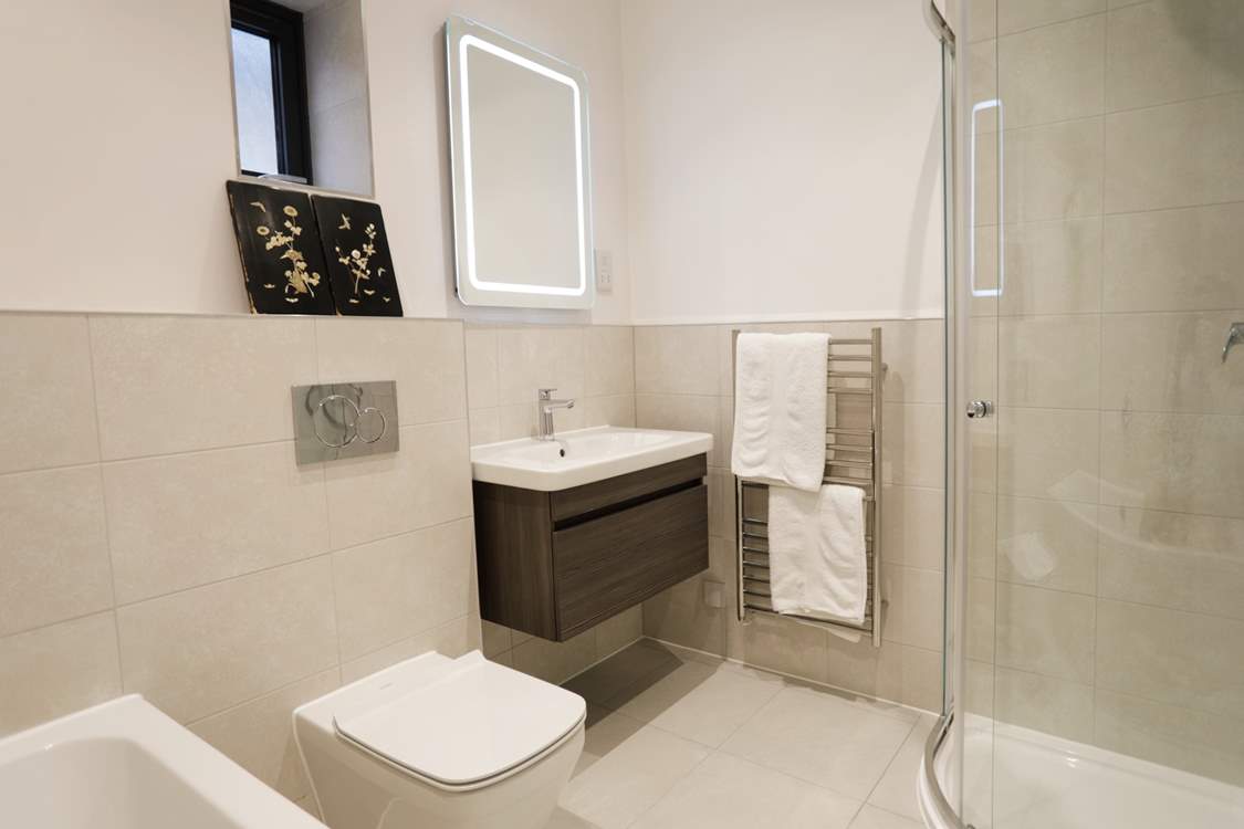 Sandpiper has four stylish bath/shower rooms.