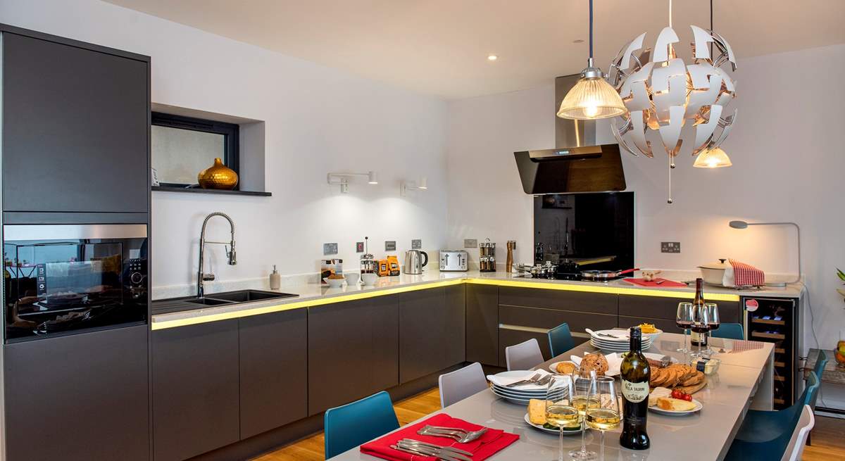 The contemporary kitchen is very well equipped