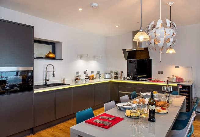 The contemporary kitchen is very well equipped
