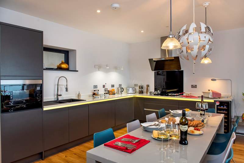 The contemporary kitchen is very well equipped