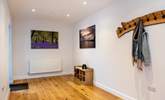 The large entrance hall provides a warm welcome and plenty of storage space - Thumbnail Image