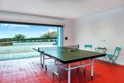 The garage doubles up as a games-room offering table-tennis and table-football, and of course if you open up the door you can still enjoy that view!