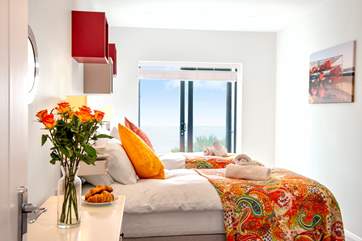 Bedroom 2 has fabulous views and an outside balcony shared with Bedroom three.