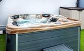 Relax on the terrace in your hot tub. - Thumbnail Image