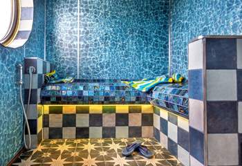After a day at the beach, relax and unwind in the steam room.