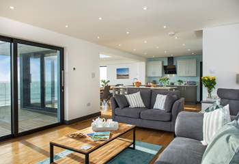 The open plan living-room takes full advantage of the view.