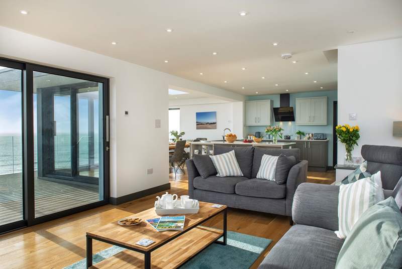The open plan living-room takes full advantage of the view.