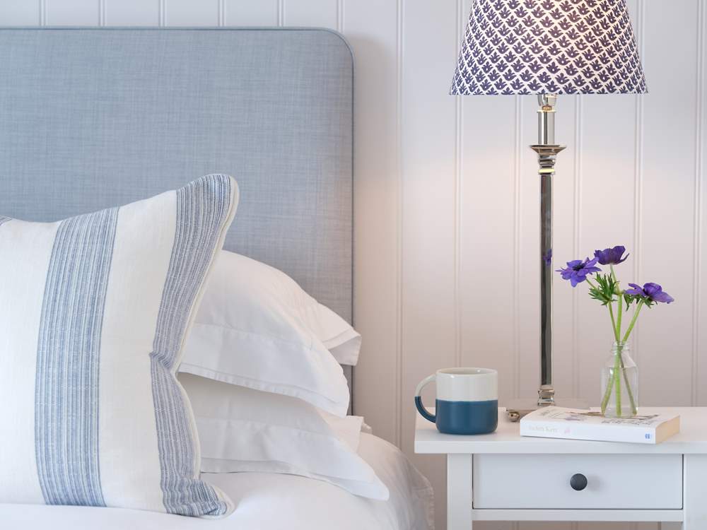 The cool blues and greys in the master bedroom.