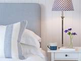 The cool blues and greys in the master bedroom.