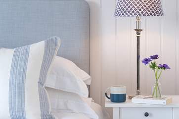 The cool blues and greys in the master bedroom.