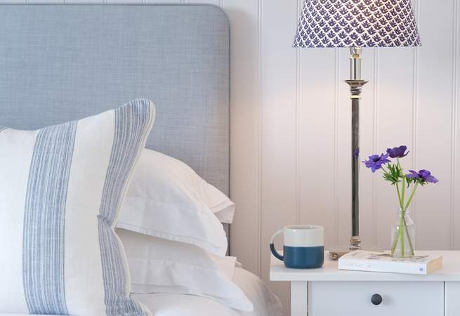 The cool blues and greys in the master bedroom.