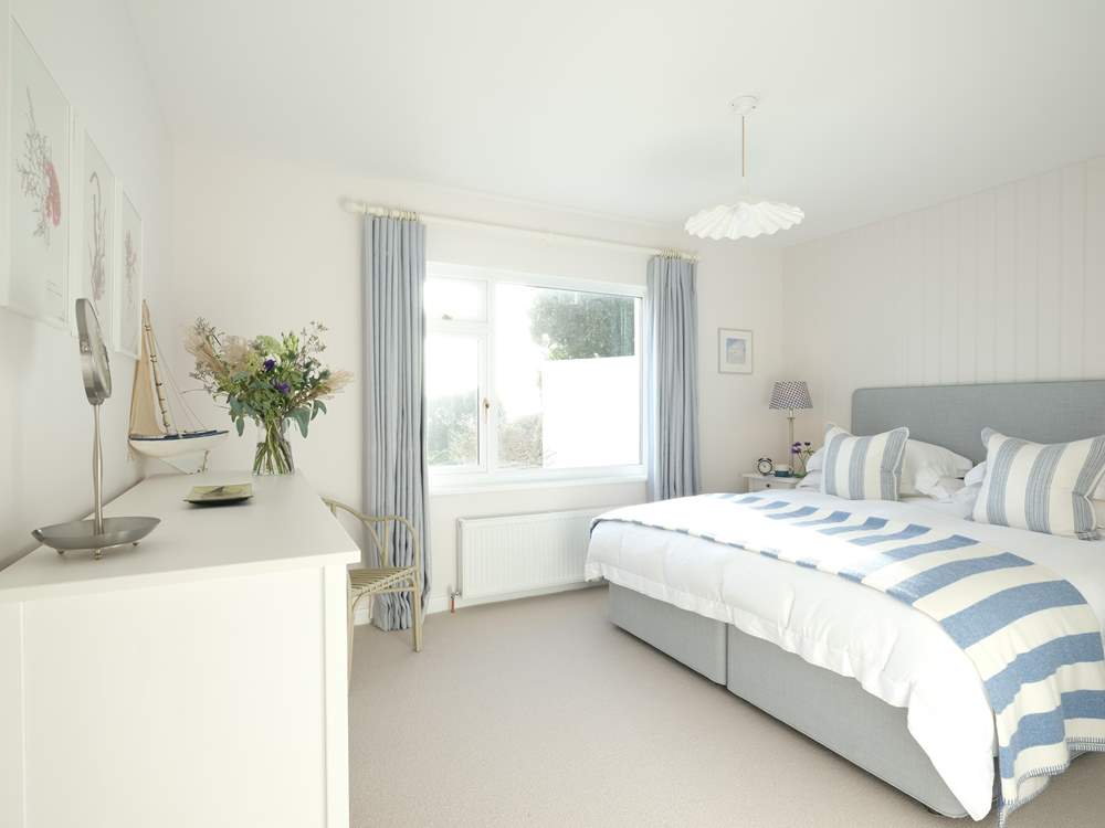 Bedroom 1 has a super-king bed and sea views.
