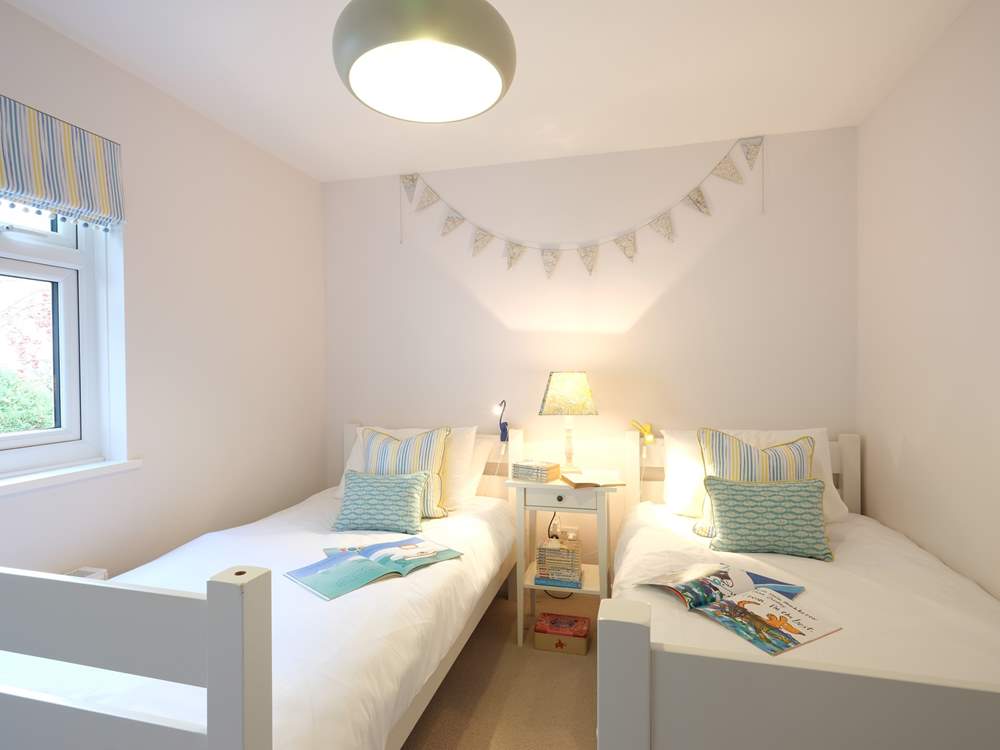 Bedroom 3 has twin beds.