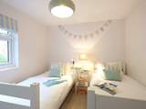 Bedroom 3 has twin beds.