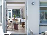 French doors lead out onto the terrace.