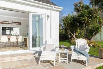 Let the outside in by opening up the dining room doors.