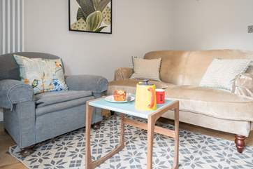 The kitchen/dining-room has additional soft seating, plenty of room for the whole family to spread out.