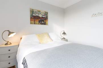 The first floor double bedroom with king-size bed.