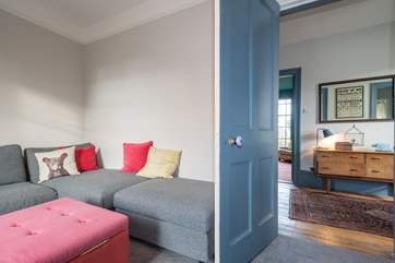 The second sitting-room on the ground floor is a perfect family room with games and large TV.