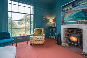 Light the wood-burner and relax in the family sitting-room.