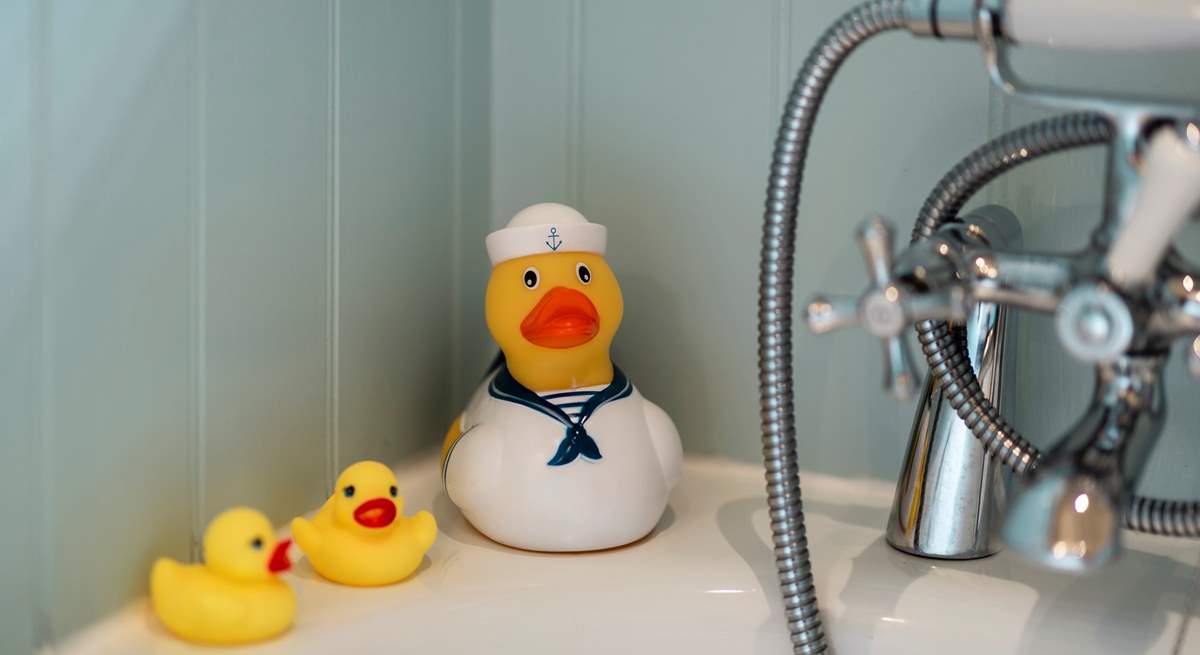 The family bathroom with hand held shower attachment and ducks!