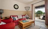 Double doors from the living area open to the private decking area. - Thumbnail Image