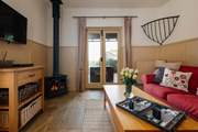 On chilly days light the wood-burning stove.
