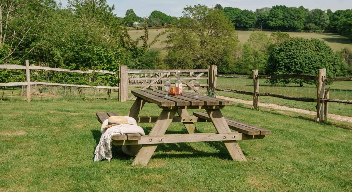 The is a lovely garden bench with views over the Sussex countryside.