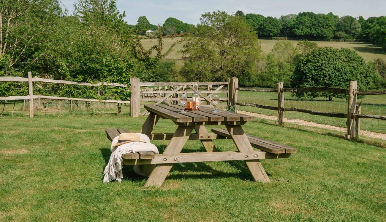 The is a lovely garden bench with views over the Sussex countryside.