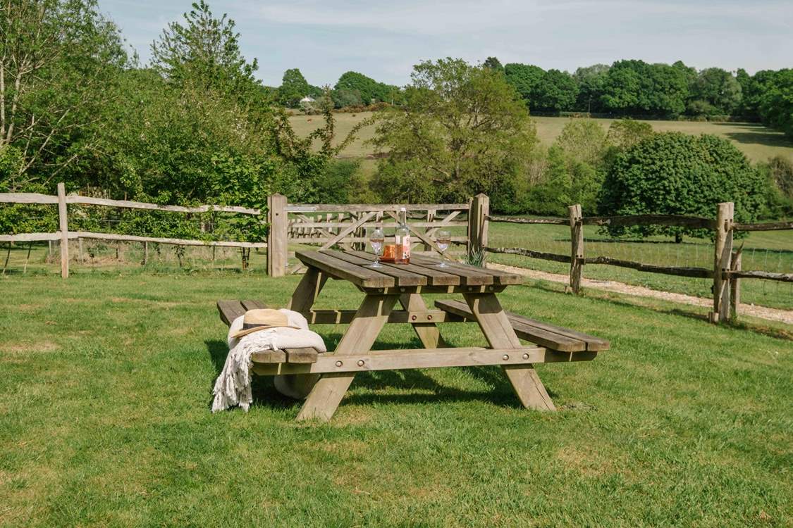 The is a lovely garden bench with views over the Sussex countryside.