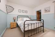The main bedroom with en suite shower room.