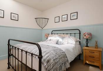 This dreamy double bedroom has an en suite shower room.