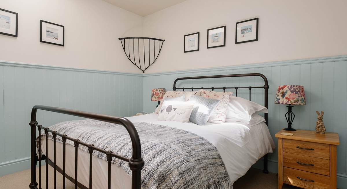 This dreamy double bedroom has an en suite shower room.