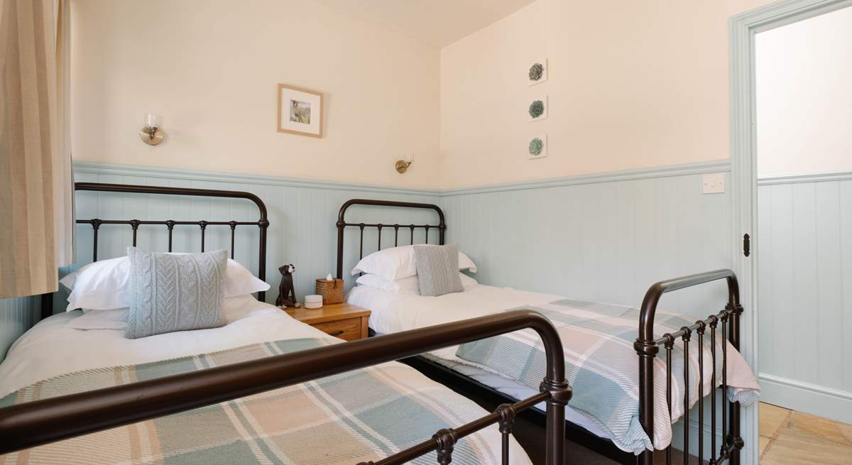 This delightful twin room is so welcoming.
